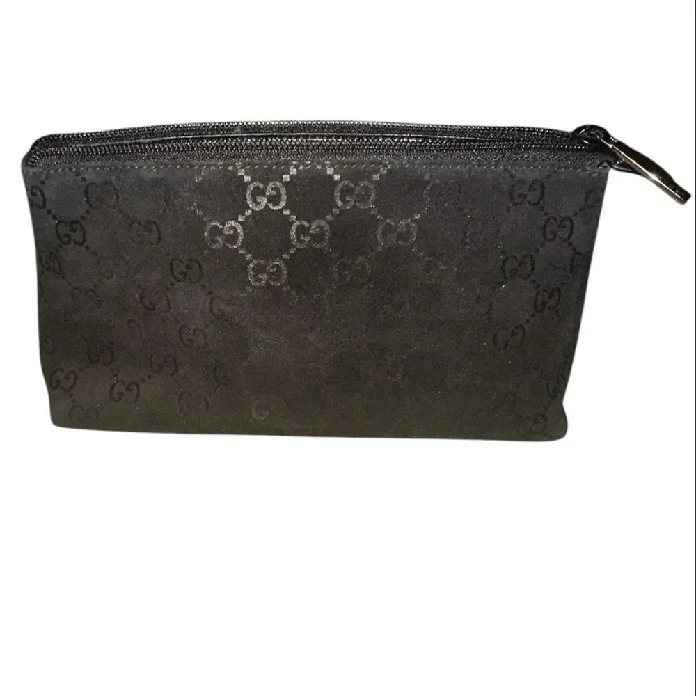 Gucci Textured Black velvet pouch.